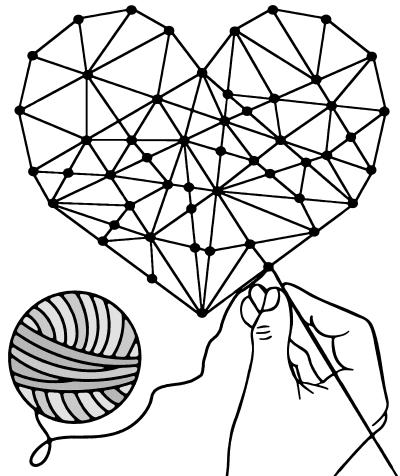 Woll-Vase mit Blumen auf Schneidebrett